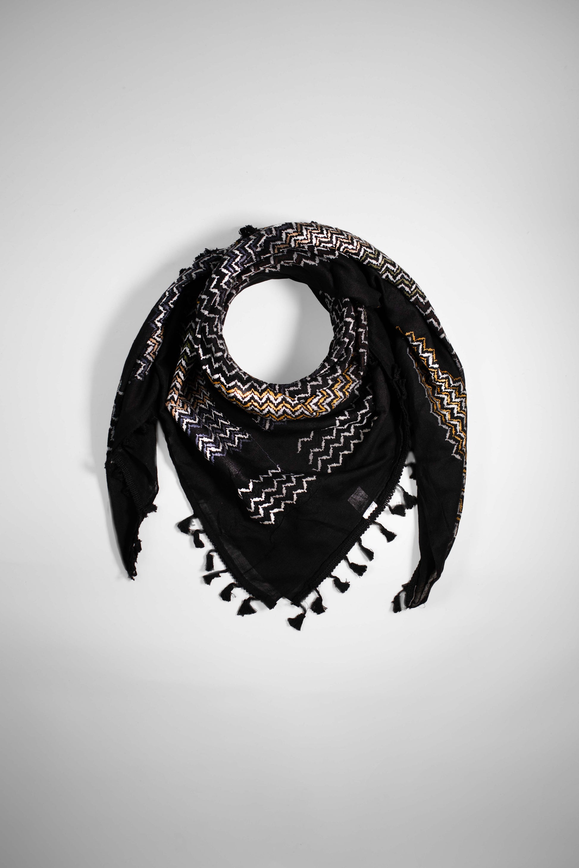Original Palestinian keffiyeh handmade in Palestine, Where to buy Palestinian kufiya in Europe, Palestinian heritage scarf for men and women, Fair trade Palestinian scarf made in Hebron