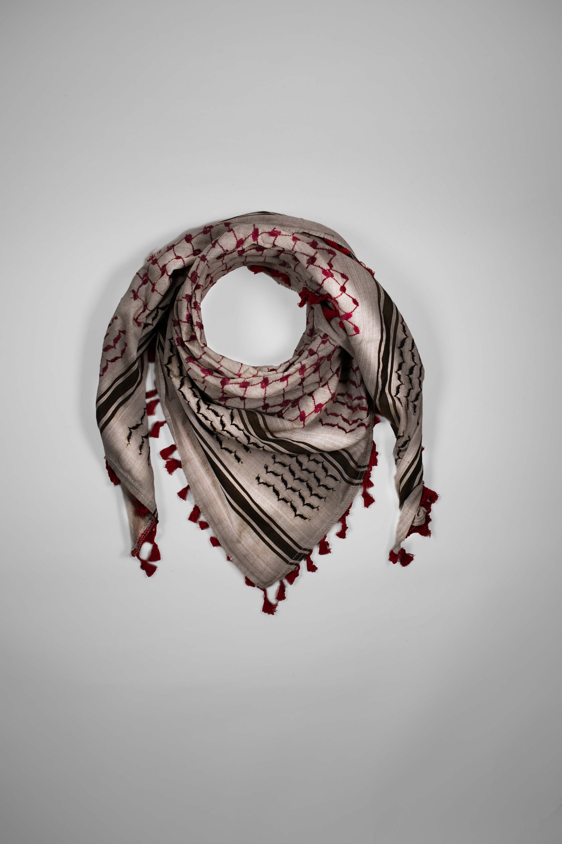 Original Palestinian keffiyeh handmade in Palestine, Where to buy Palestinian kufiya in Europe, Palestinian heritage scarf for men and women, Fair trade Palestinian scarf made in Hebron