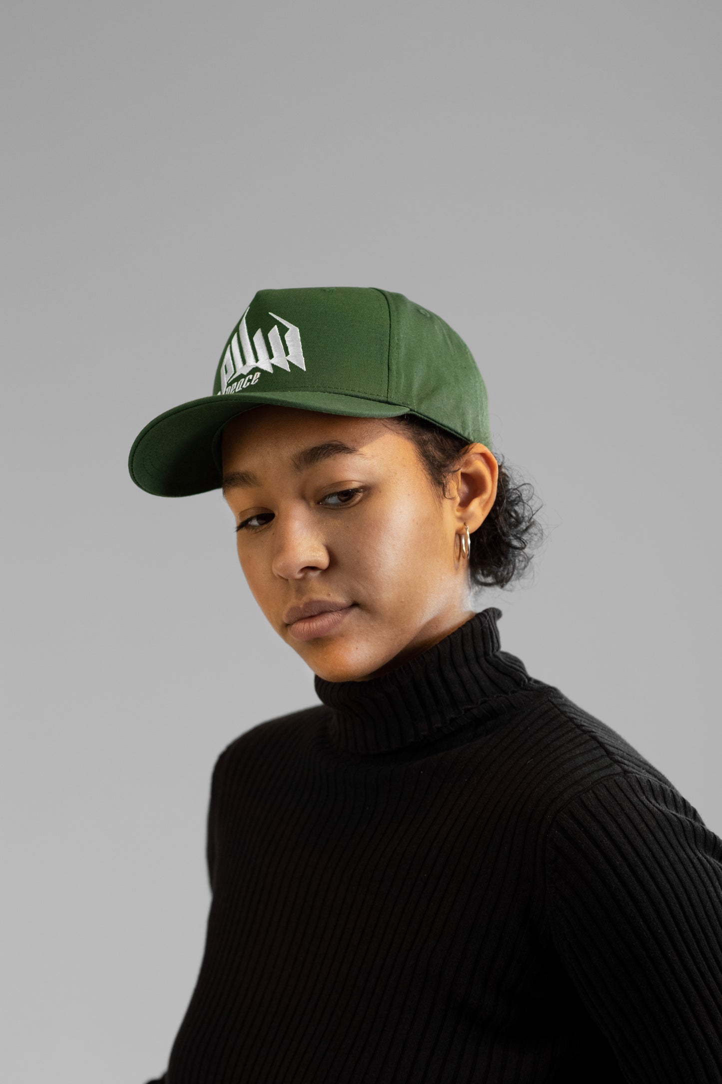 Embroidered Palestinian cap with ‘Peace & Freedom for Palestine’ text, inspired by Palestinian heritage and cultural resilience. Stylish and meaningful headwear for solidarity and justice