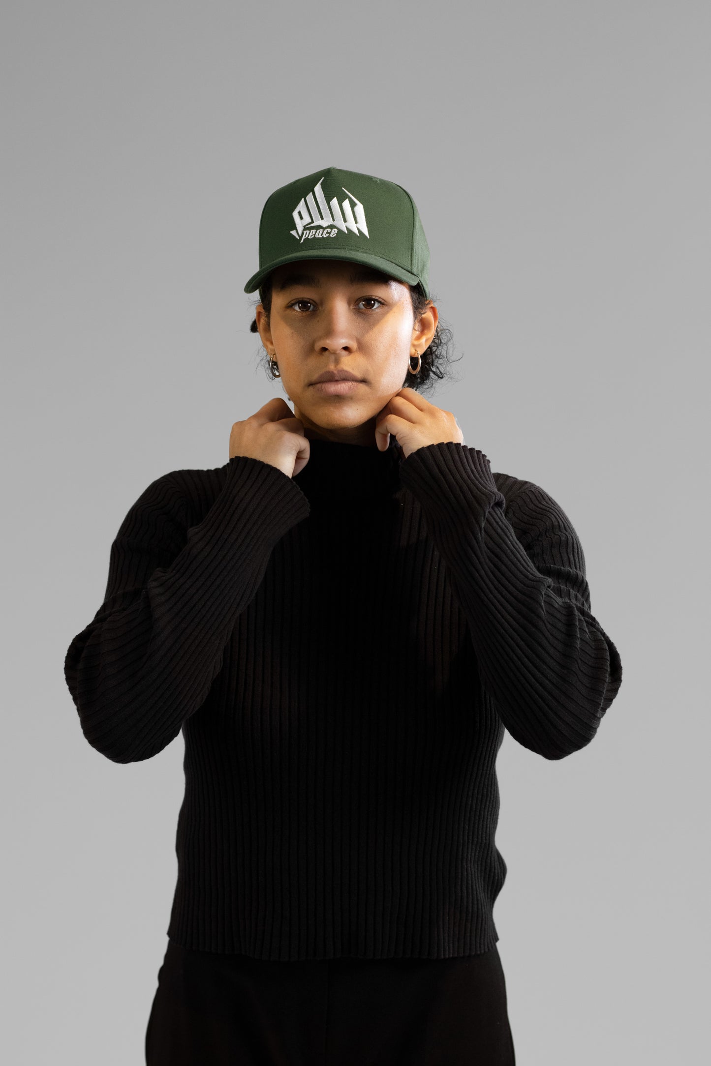 Embroidered Palestinian cap with ‘Peace & Freedom for Palestine’ text, inspired by Palestinian heritage and cultural resilience. Stylish and meaningful headwear for solidarity and justice
