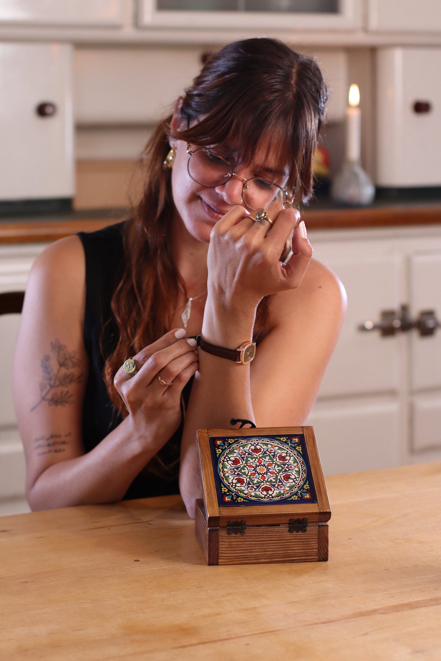A girl using a handcrafted wooden box from Hebron, Palestine, Ceramic box - palistone brand