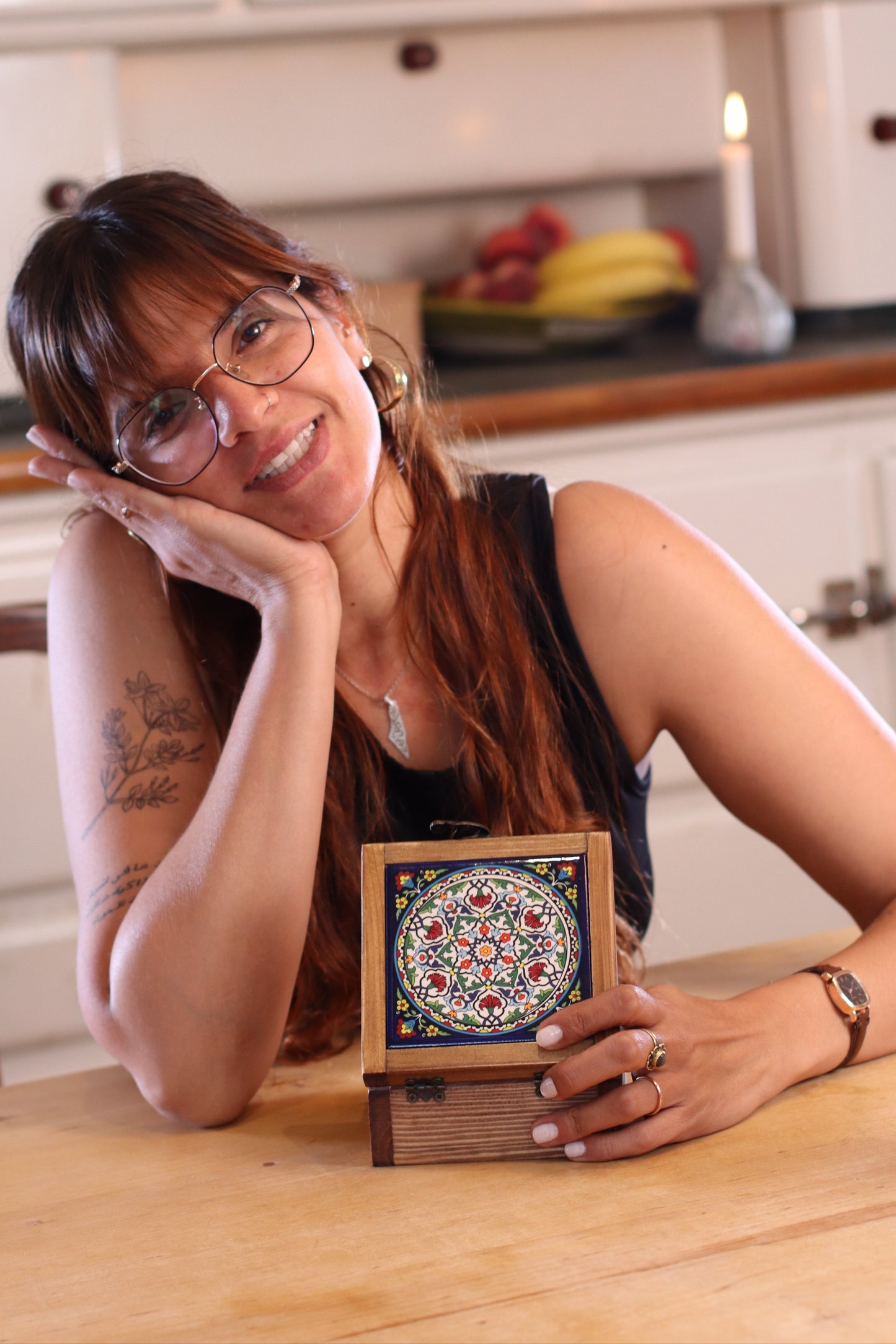 A girl using a handcrafted wooden box from Hebron, Palestine, Ceramic box - palistone brand