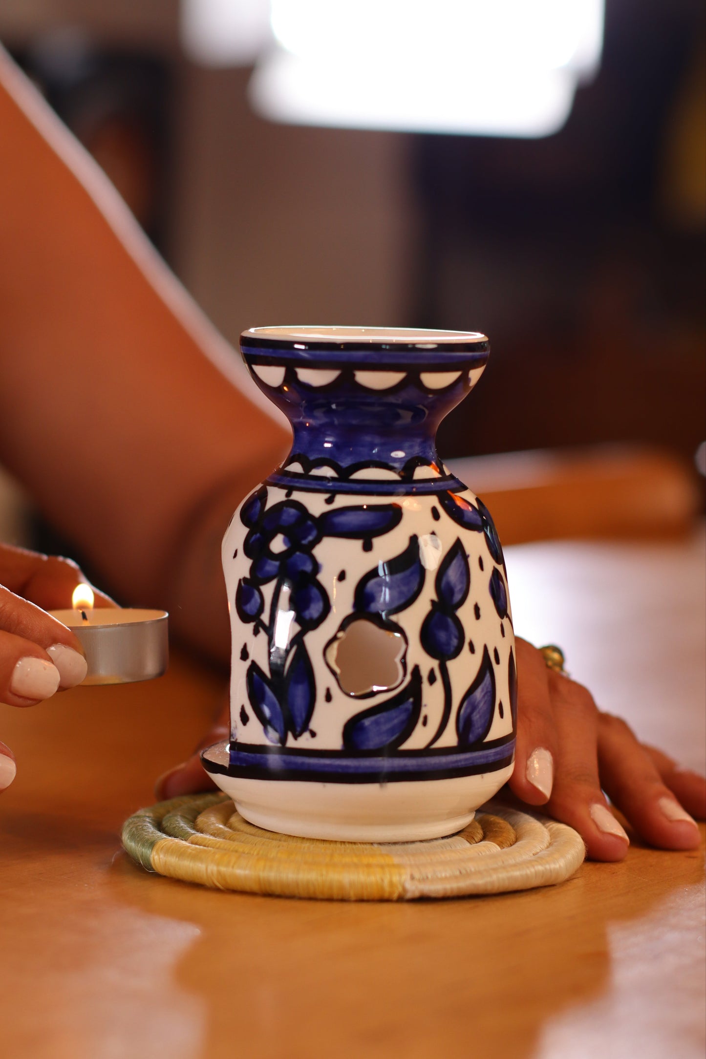handmade ceramic incense burner from Hebron, Palestine, beautifully painted with watercolor floral designs. A perfect blend of traditional craftsmanship and artistic beauty