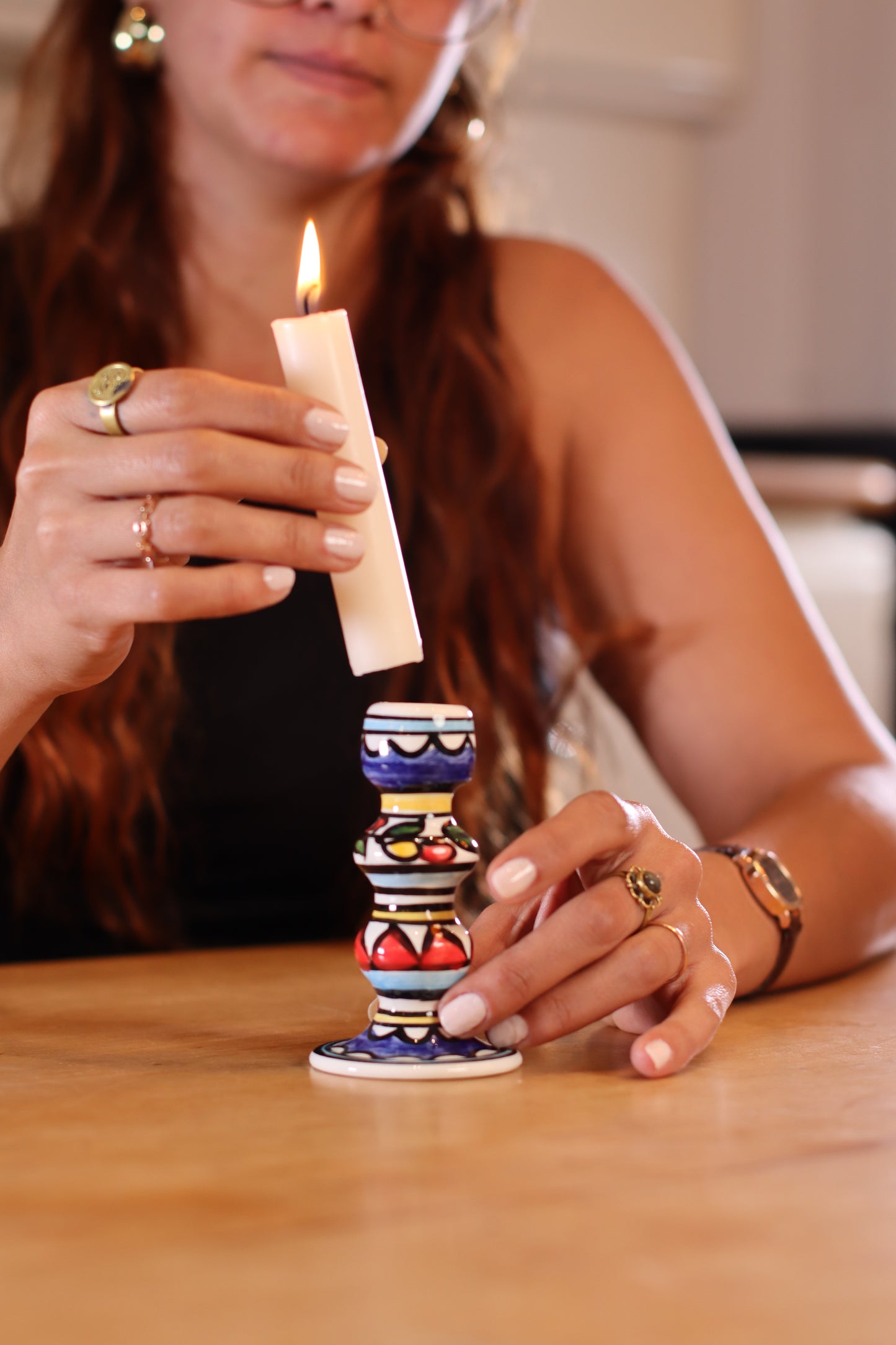 Hand-painted candle holder crafted in Palestine with delicate watercolor designs, perfect for adding a cultural and artistic touch to any space.”