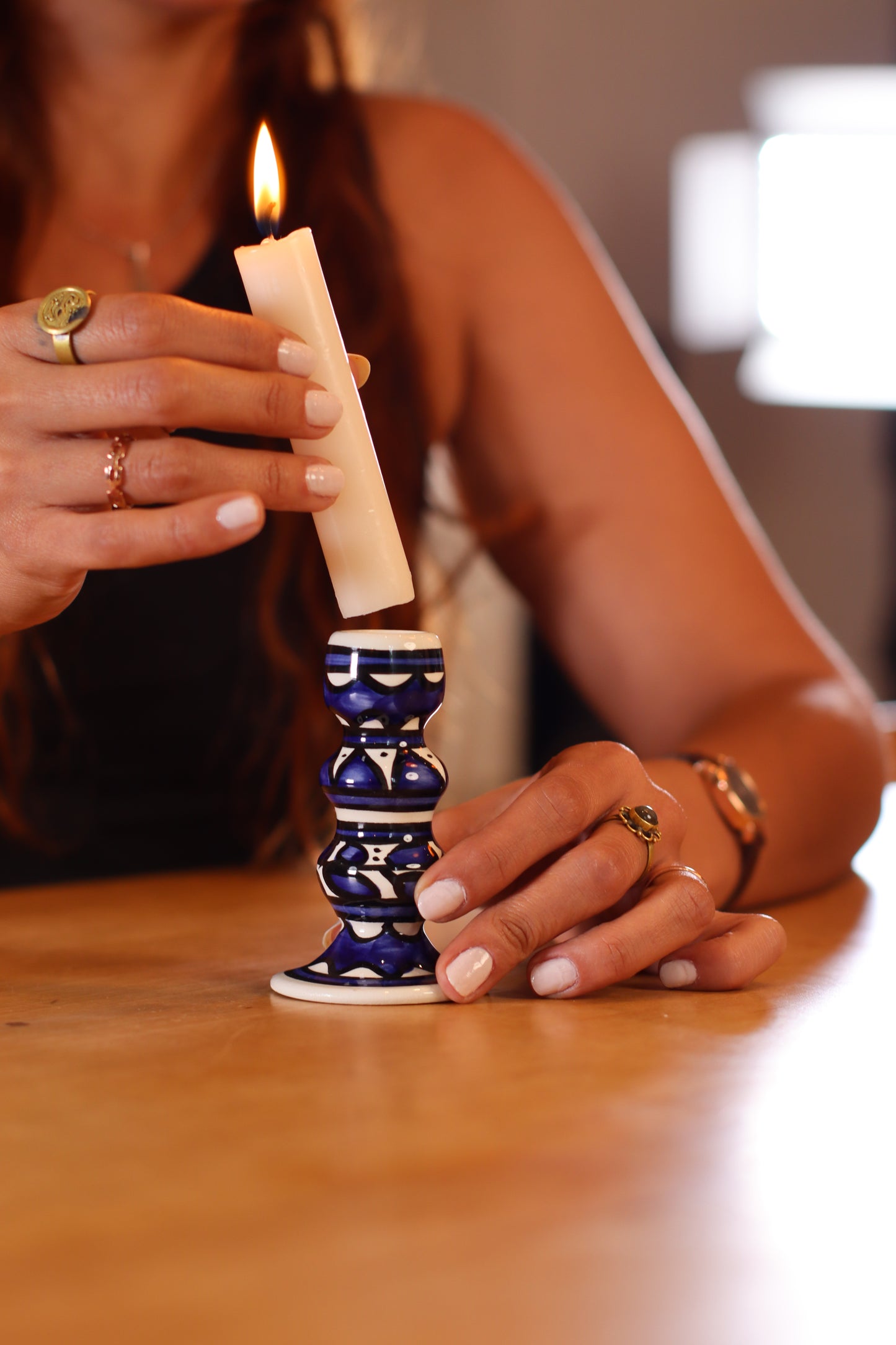 Hand-painted candle holder crafted in Palestine with delicate watercolor designs, perfect for adding a cultural and artistic touch to any space.”