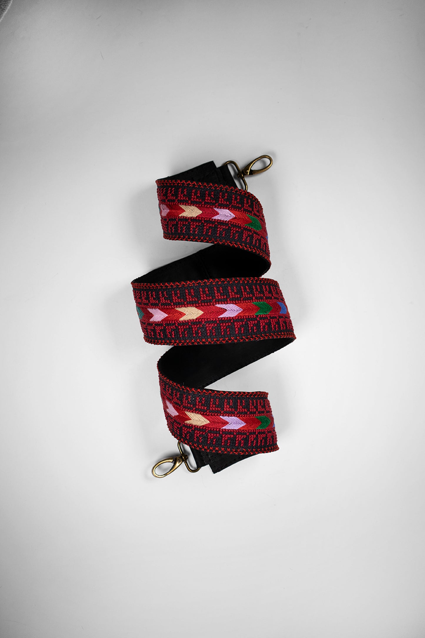 Handmade leather belt with traditional embroidery from Hebron, Palestine, PaliStone brand.”