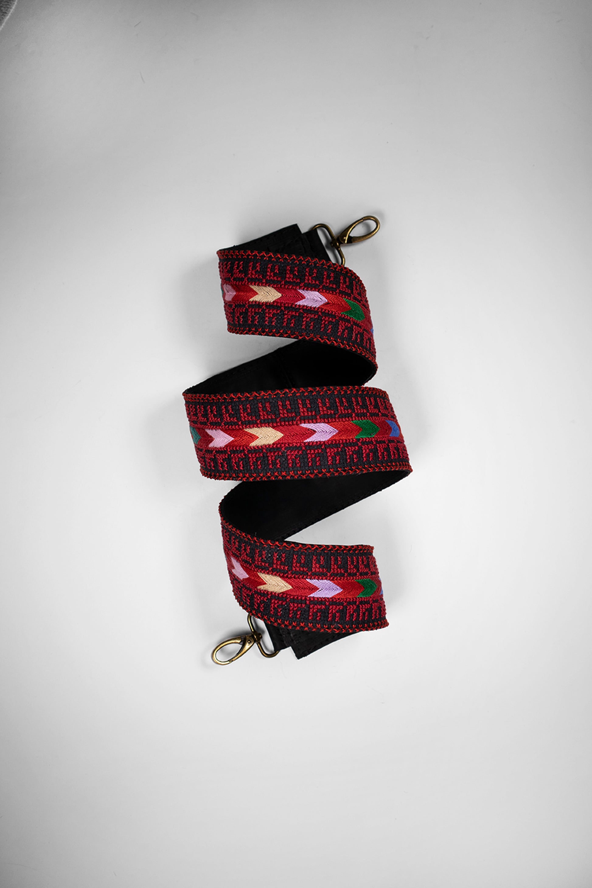 Handmade leather belt with traditional embroidery from Hebron, Palestine, PaliStone brand.”