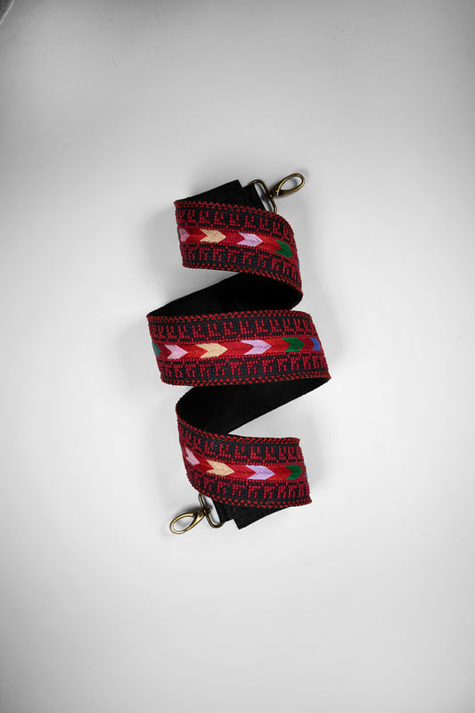 Handmade leather belt with traditional embroidery from Hebron, Palestine, PaliStone brand.”