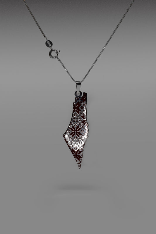 	silver 925 Palestine map pendant necklace with red traditional embroidery design
	•	Palestinian heritage silver pendant map with red Darza pattern
	•	handmade silver 925 necklace Palestine map with red embroidery motif
	•	unique silver pendant representing Palestine map and traditional Darza
	•	silver 925 necklace with Palestinian map and heritage embroidery detail
