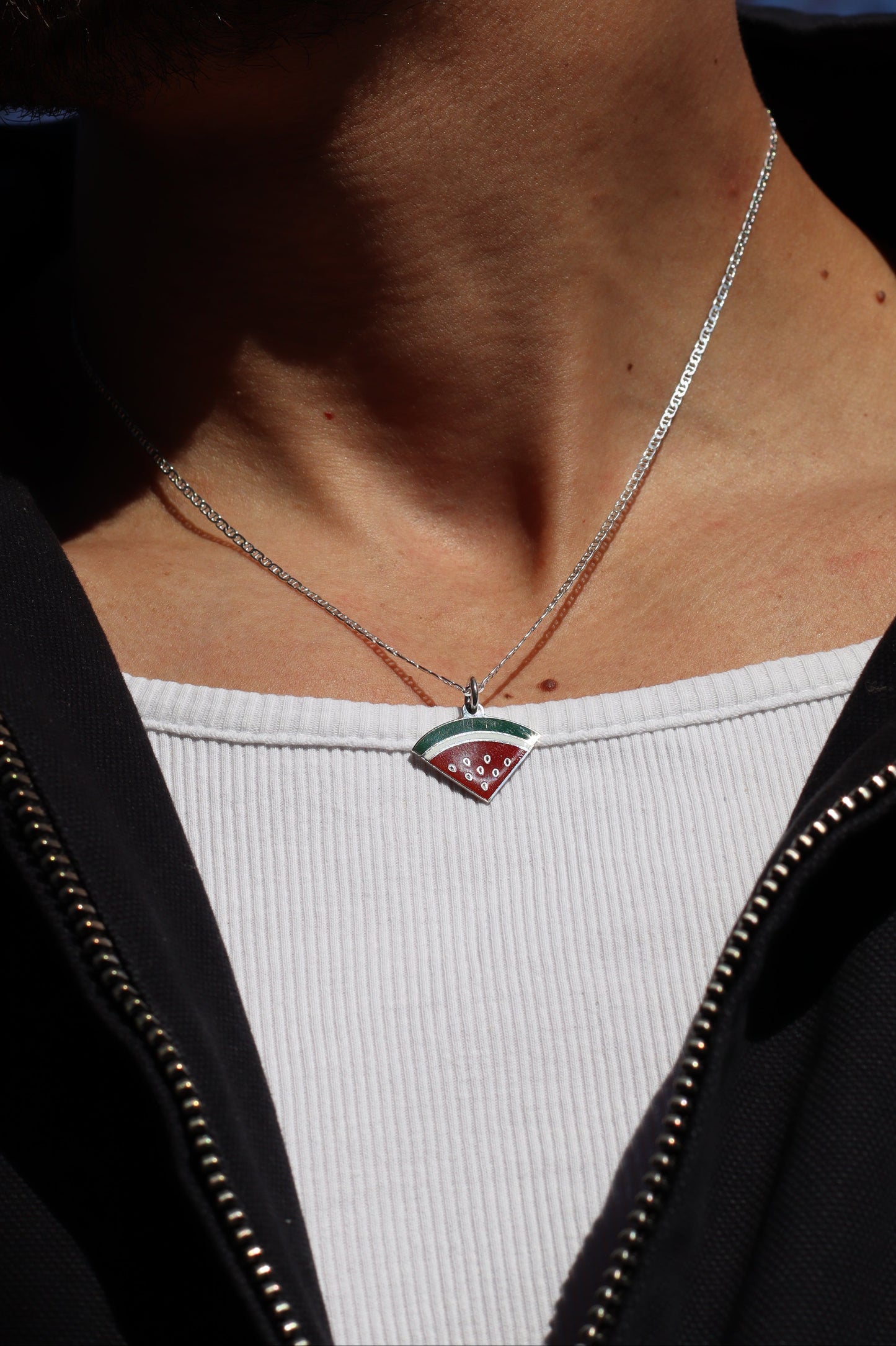 •	silver 925 Palestine watermelon slice pendant necklace
	•	handmade silver pendant necklace representing Palestine watermelon
	•	Palestinian heritage silver necklace watermelon shaped pendant