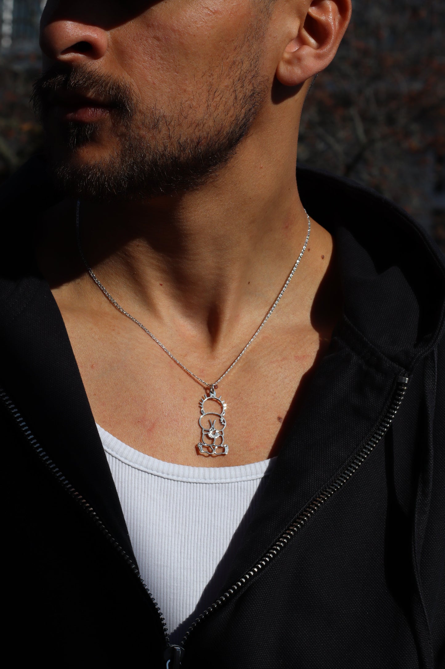 •	handmade silver 925 pendant Handalah Palestinian cultural symbol
	•	unique silver necklace Handalah character frame pendant