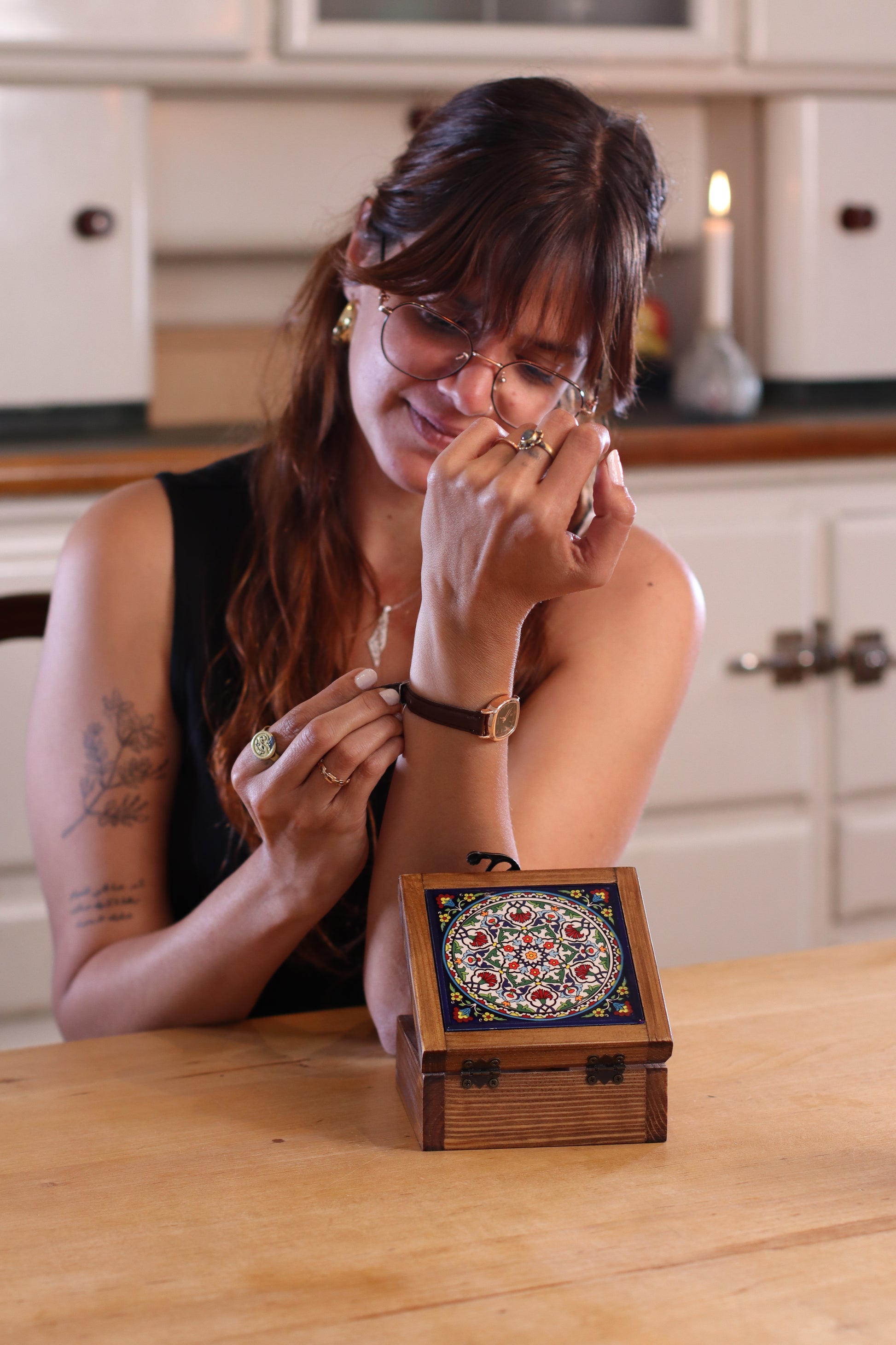 A girl using a handcrafted wooden box from Hebron, Palestine, Ceramic box - palistone brand