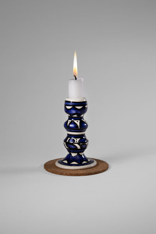 handmade ceramic candle holder
	•	Palestinian pottery candle stand
	•	hand-painted ceramic candlestick
	•	artisan candle holder
	•	Hebron ceramic candle decor
